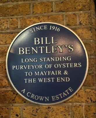 The blue plaque at Bentley's, purveyor of oysters to Mayfair since 1916